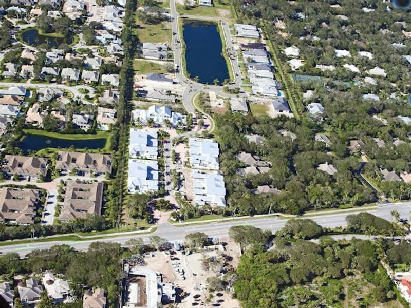 Aerial view of the The Strand community in Vero Beach, FL, showing layout and nearby surroundings (Image 27).