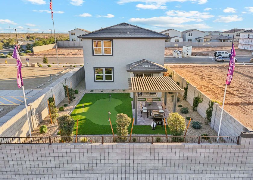 A house with a pool and a lawn. A house with a pool and a lawn.