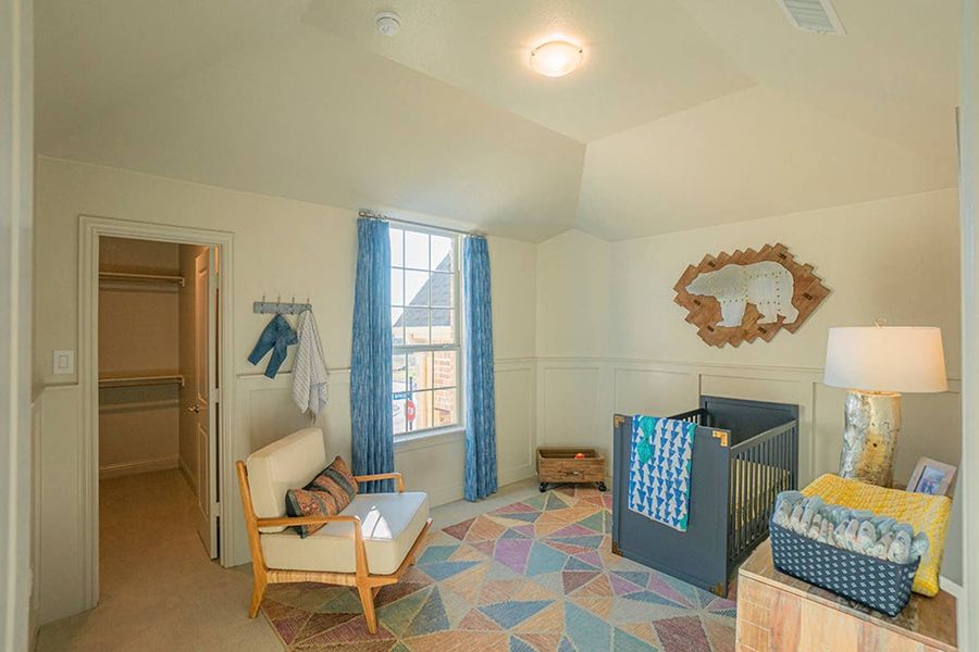 Furnished interior in a model home at Woodcreek in Fate (Image 25).
