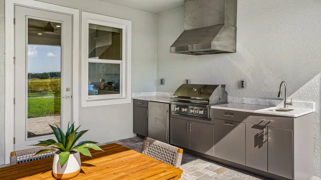 Furnished interior in a model home at Ardisia Park in New Smyrna Beach (Image 69).