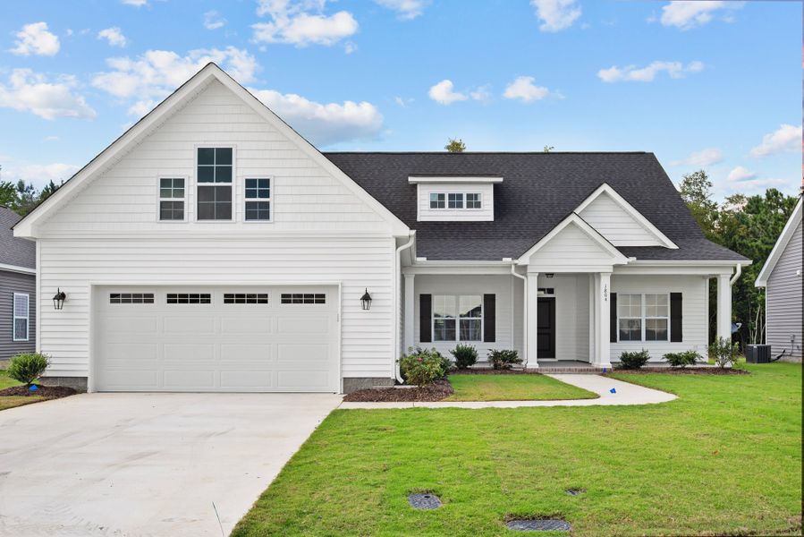 Front exterior of a home in the The Villas at Langston Farms community, located in Winterville, NC (Image 1).