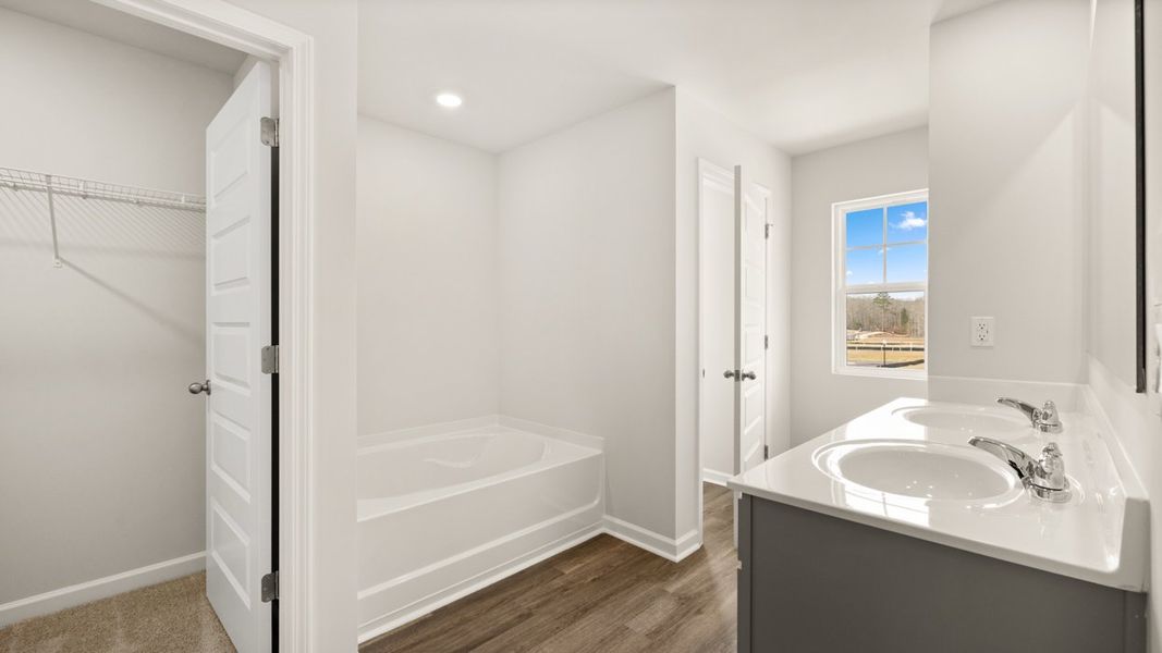 Furnished interior in a model home at The Reserve at North Bridges in McDonough (Image 22).