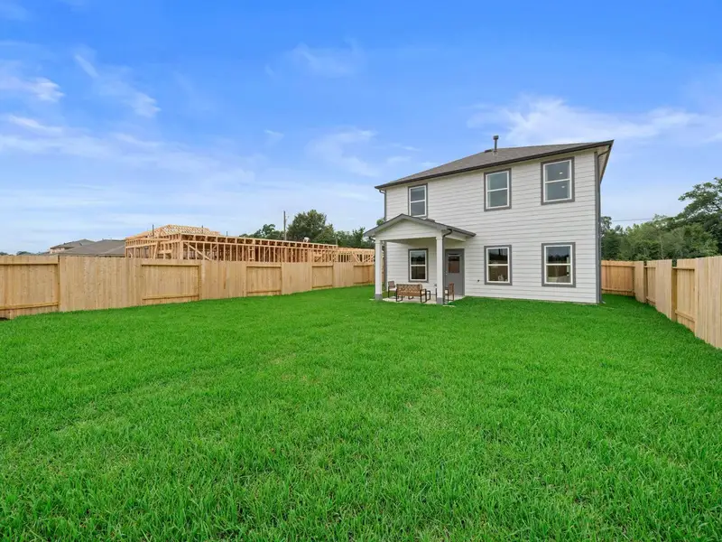 Exterior details of a home in Spring Branch Crossing, Conroe (Image 1).