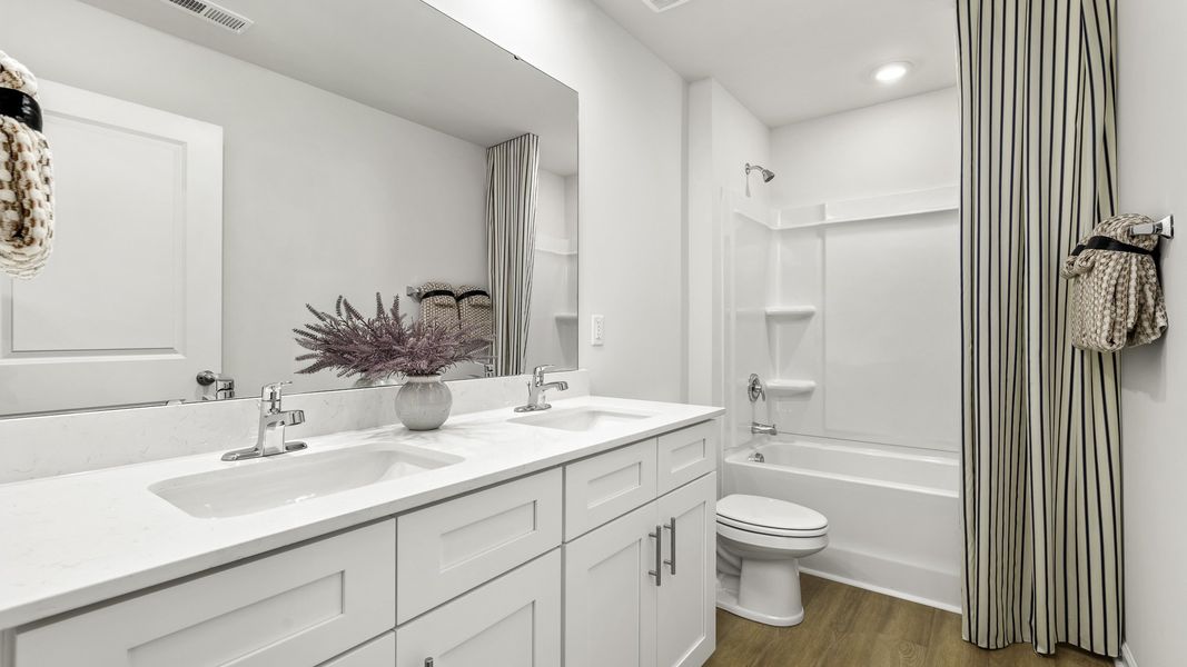 Furnished interior in a model home at Brookhaven in Greensboro (Image 21).