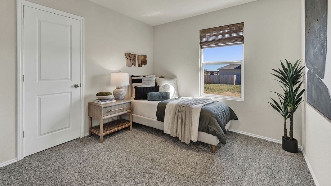 Furnished interior in a model home at Spring Valley in New Braunfels (Image 6).