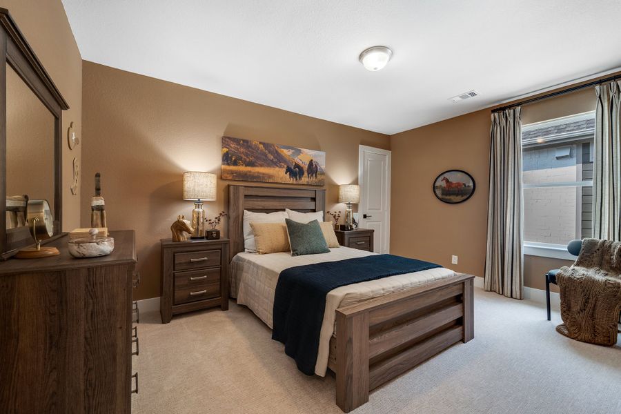 Furnished interior in a model home at Creekhaven in Iowa Colony (Image 17).