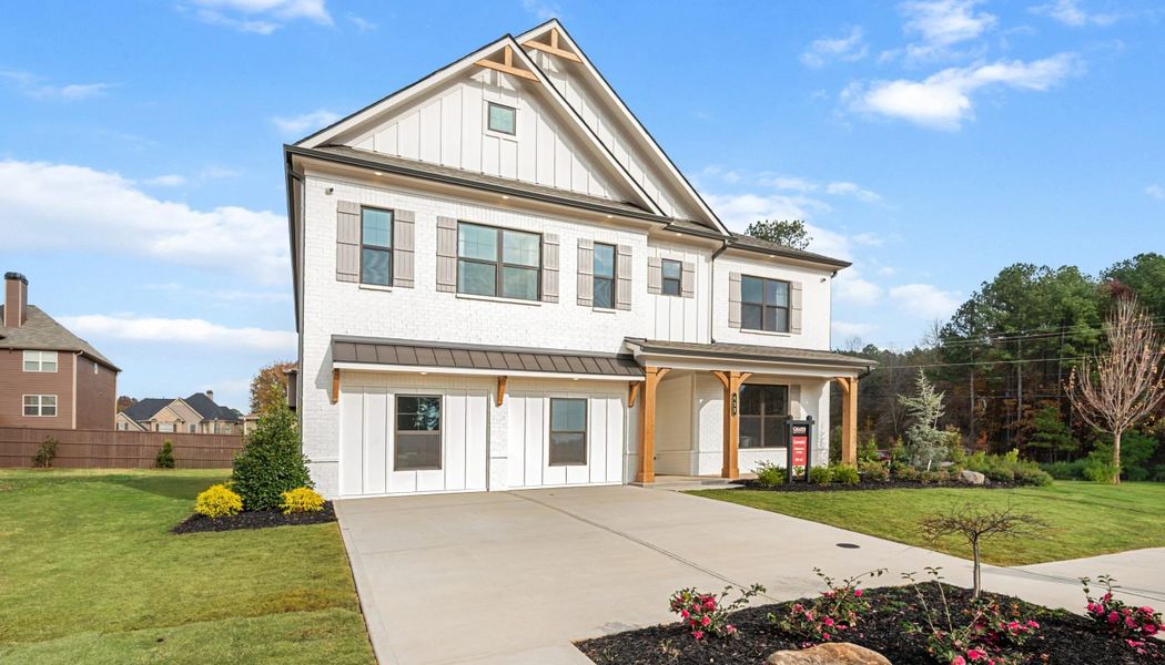 Front exterior of a home in the Pinecrest Ridge community, located in Dacula, GA (Image 13).