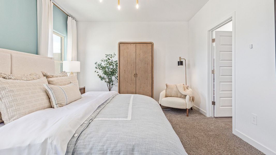 Furnished interior in a model home at Redford Estates in Tucson (Image 15).