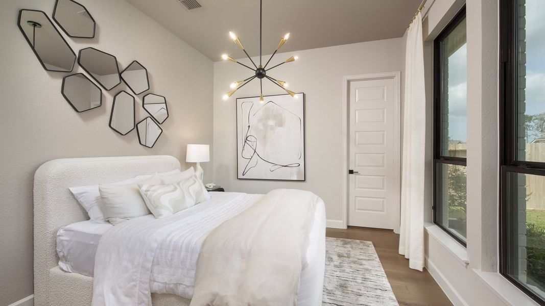 Furnished interior in a model home at Riceland 70' in Mont Belvieu (Image 19).