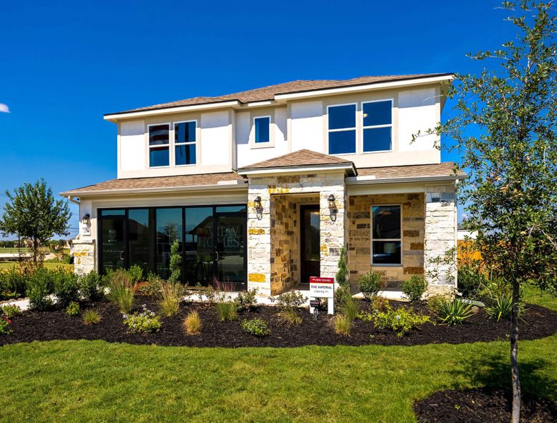 Front exterior of a home in the August Fields community, located in New Braunfels, TX (Image 2). Front exterior of a home in the August Fields community, located in New Braunfels, TX (Image 2).