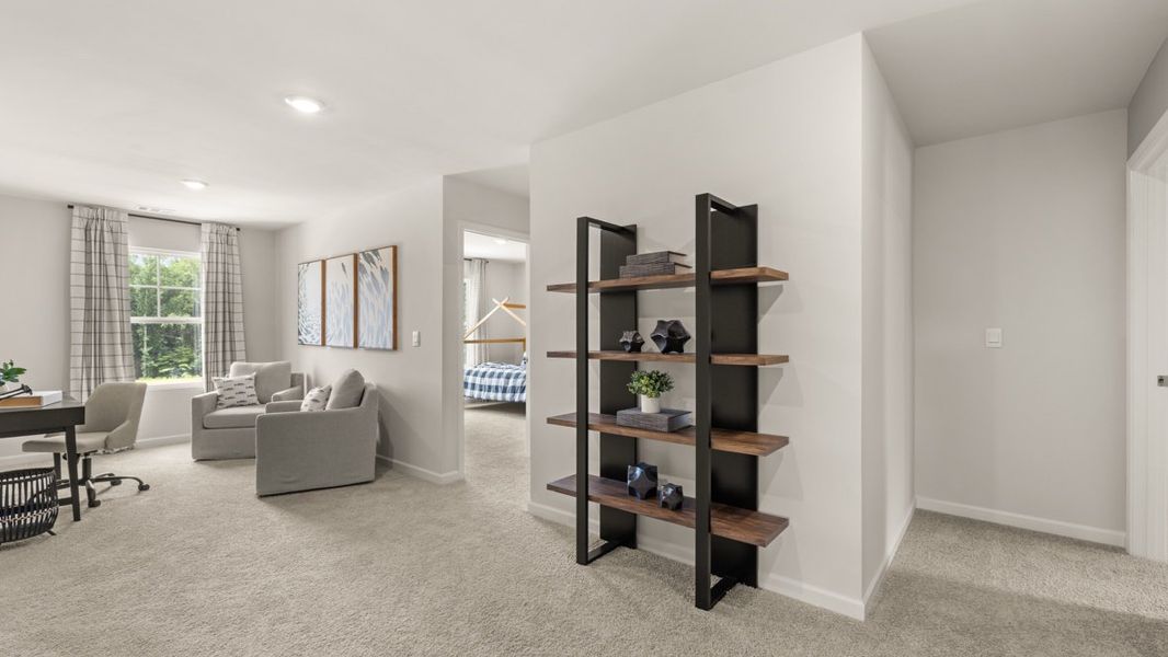Furnished interior in a model home at Grandview at Lanier in Dawsonville (Image 18).