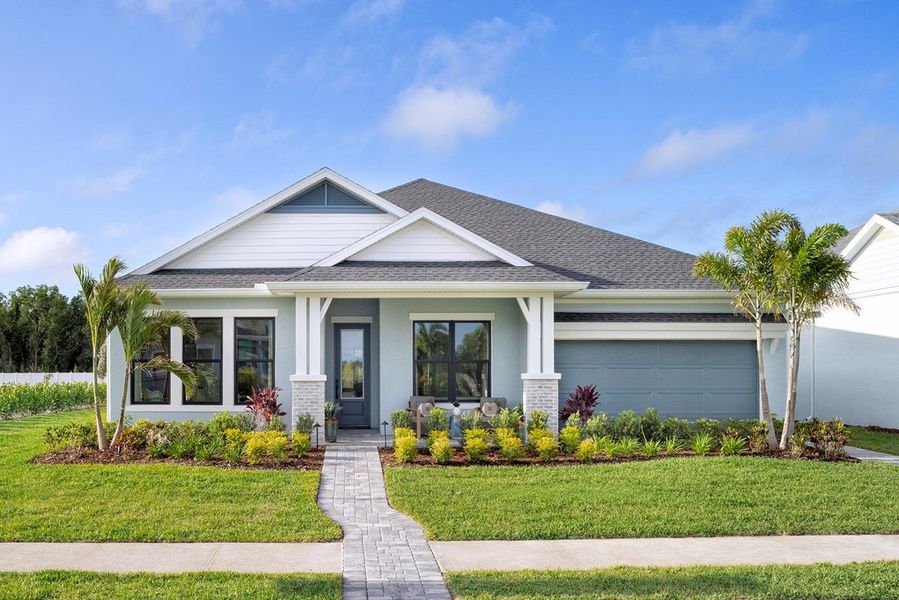 Front exterior of a home in the Lakeview Crossing – Classic Series community, located in Sarasota, FL (Image 4).