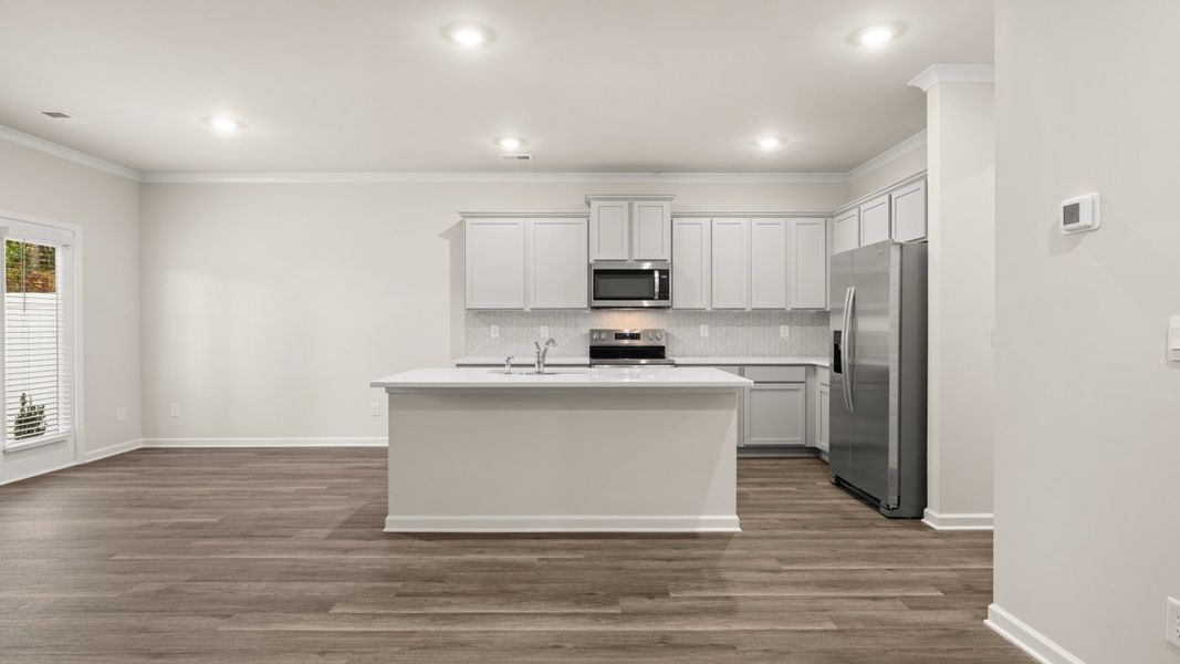 Furnished interior in a model home at Independence Villas and Townhomes in Loganville (Image 24).