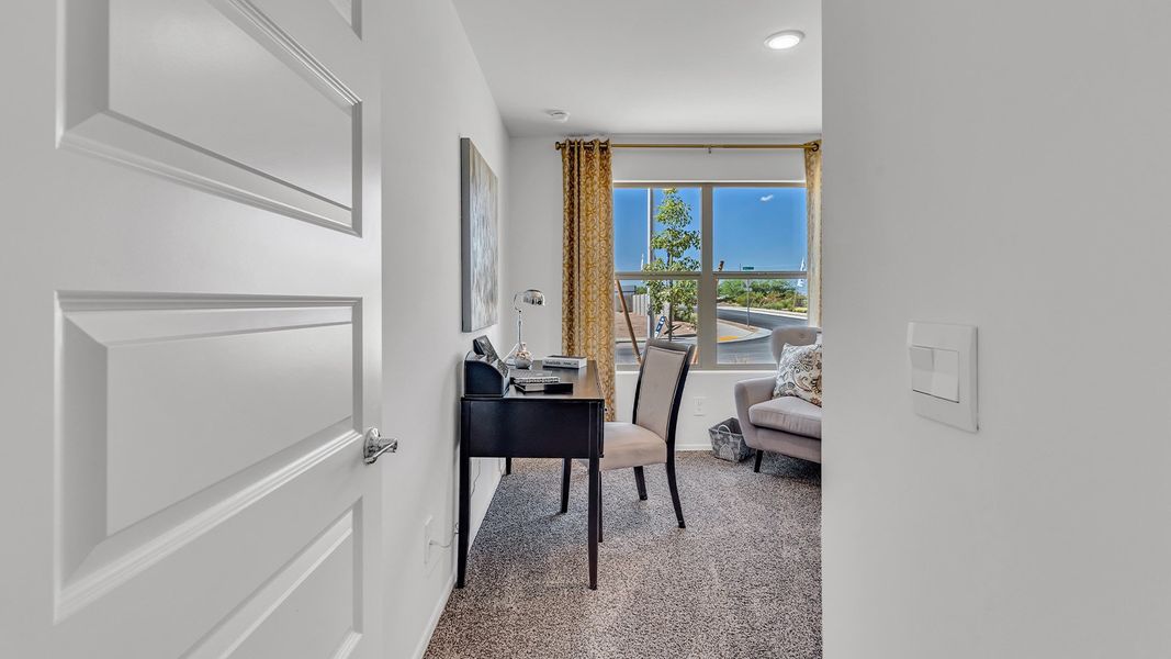 Furnished interior in a model home at Senita Crossing in Tucson (Image 46).
