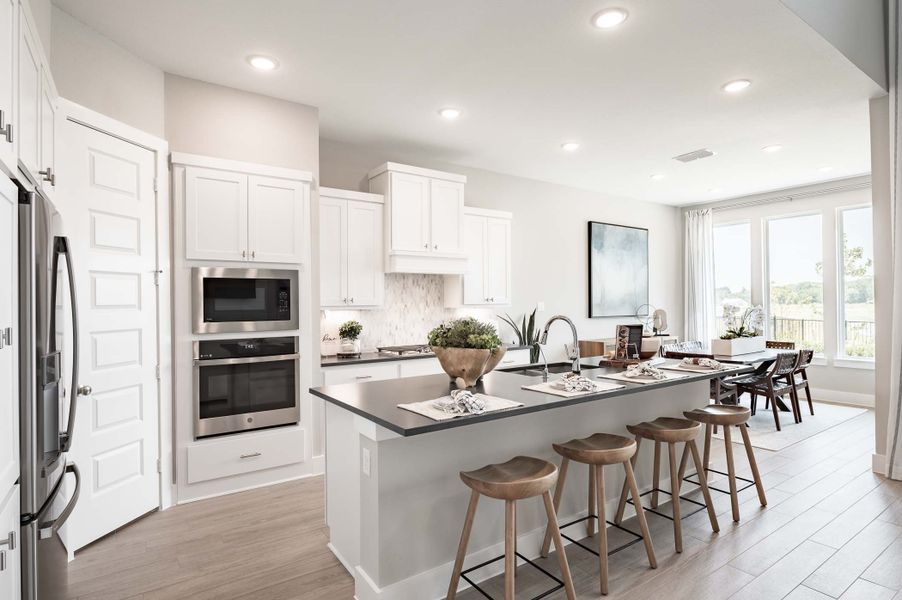 Furnished interior in a model home at The Orchard At Pecan Ridge in Fulshear (Image 6).