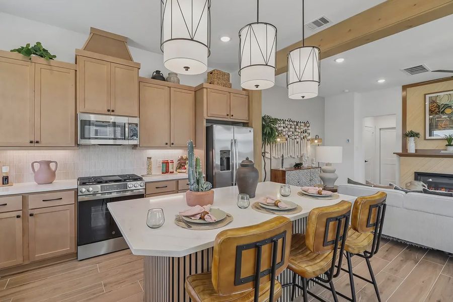 Furnished interior in a model home at Meridiana Chateau in Iowa Colony (Image 5).