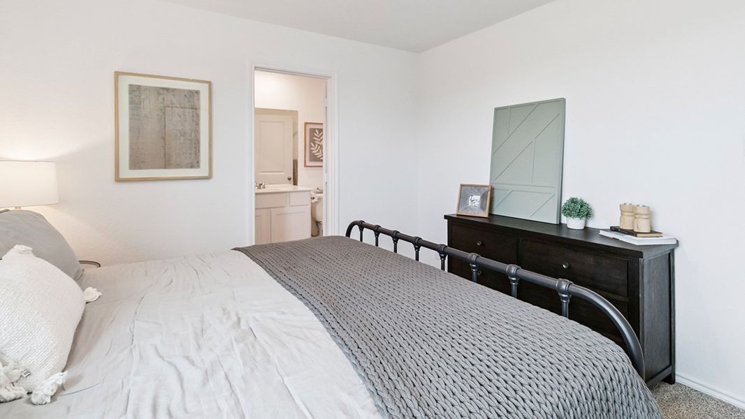 Furnished interior in a model home at Blue Ridge Ranch in San Antonio (Image 19).