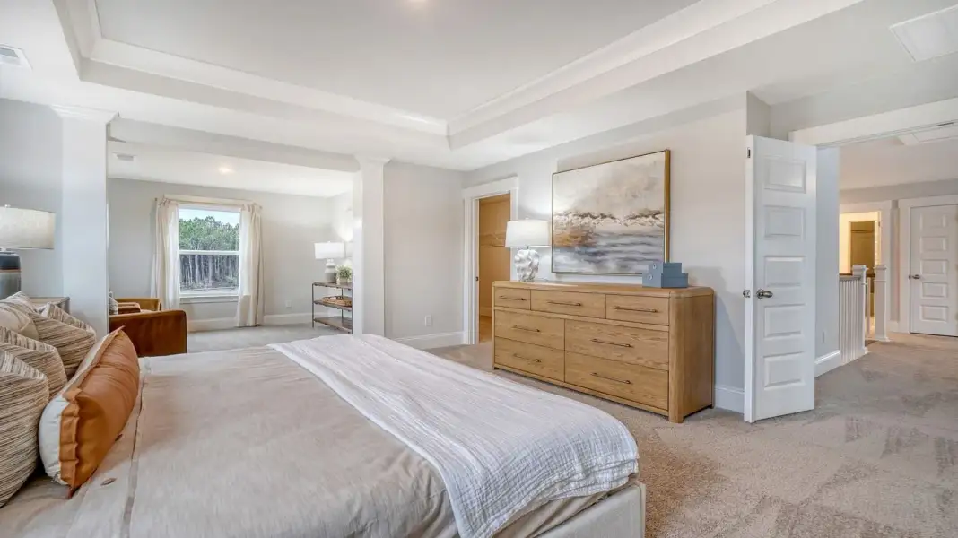 Furnished interior in a model home at Wappetaw Woods in Awendaw (Image 16).