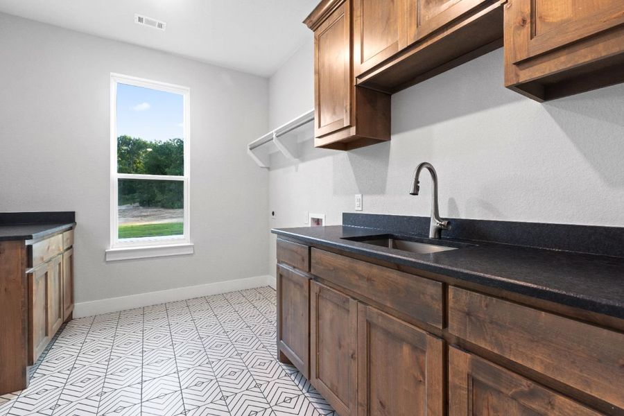Furnished interior in a model home at Lola Creek Ranch in Boyd (Image 49).