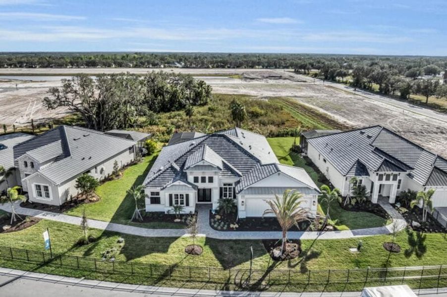 Aerial view of the River Preserve Estates community in Parrish, FL, showing layout and nearby surroundings (Image 12). Aerial view of the River Preserve Estates community in Parrish, FL, showing layout and nearby surroundings (Image 12).