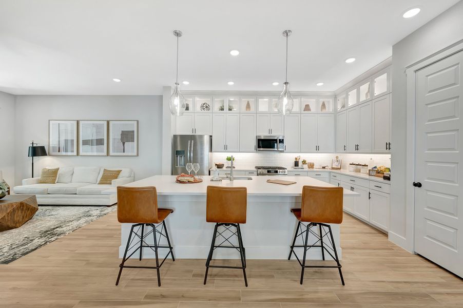 Furnished interior in a model home at The Woodlands Hills - Reserve Collection in Willis (Image 7).
