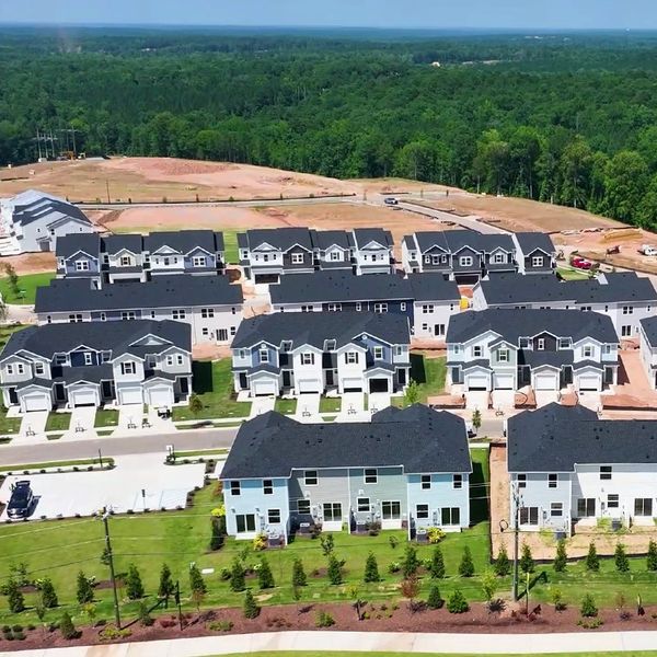 Aerial view of the Brooks Mill I Townhomes community in Durham, NC, showing layout and nearby surroundings (Image 2). Aerial view of the Brooks Mill I Townhomes community in Durham, NC, showing layout and nearby surroundings (Image 2).
