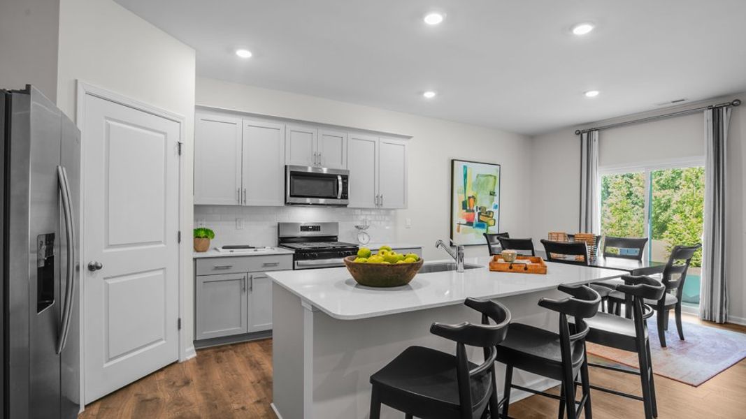 Furnished interior in a model home at Anderson Farm in Wendell (Image 7).