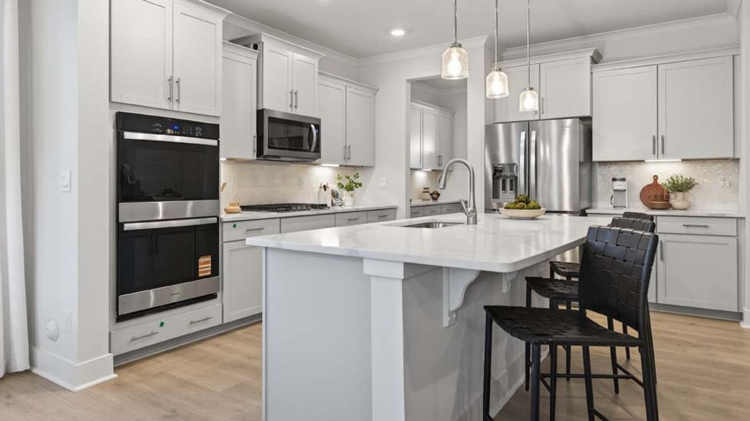 Furnished interior in a model home at Oak Grove Hill in Huntersville (Image 7). Furnished interior in a model home at Oak Grove Hill in Huntersville (Image 7).