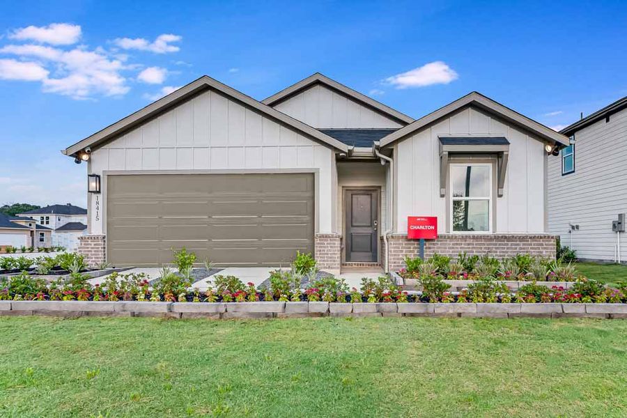 Front exterior of a home in the Newport Grove 50s community, located in Crosby, TX (Image 1).