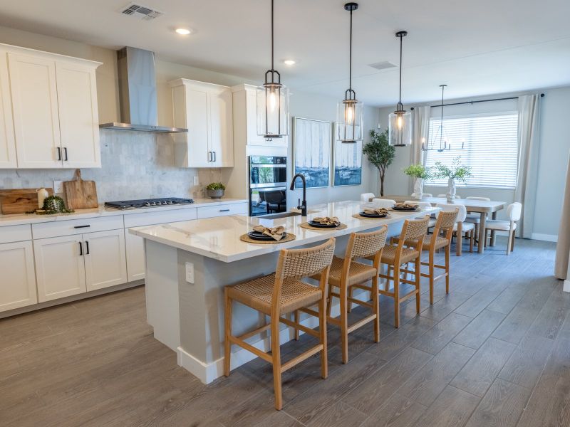 Furnished interior in a model home at White Tank Foothills Signature Series in Waddell (Image 5).