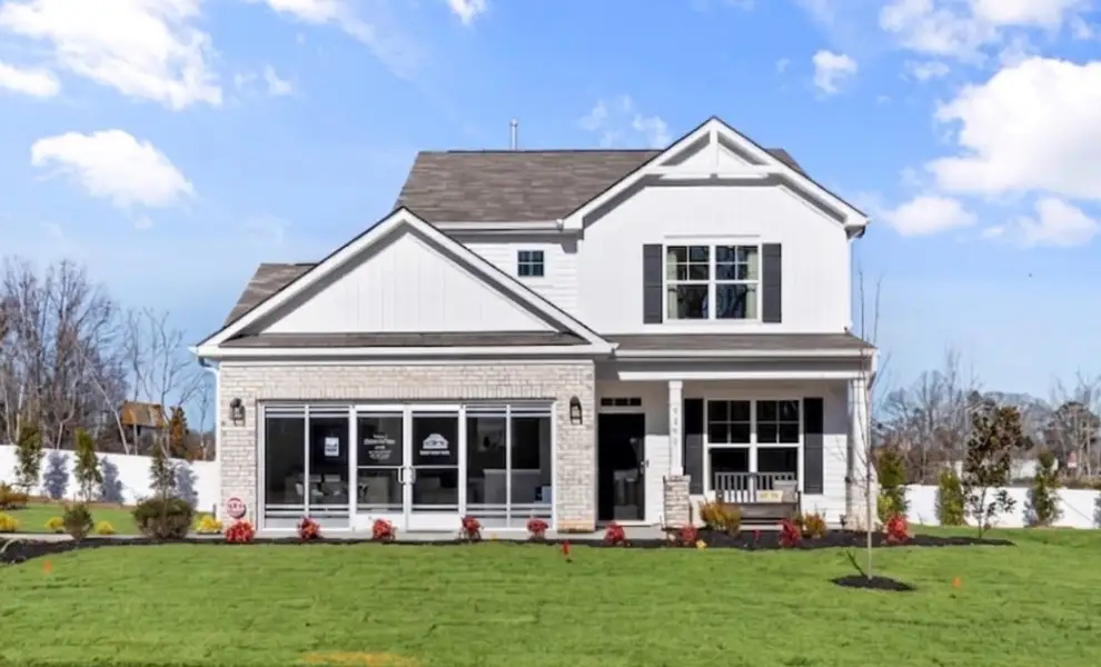 Front exterior of a home in the Chandler Ridge community, located in McLeansville, NC (Image 1). Front exterior of a home in the Chandler Ridge community, located in McLeansville, NC (Image 1).