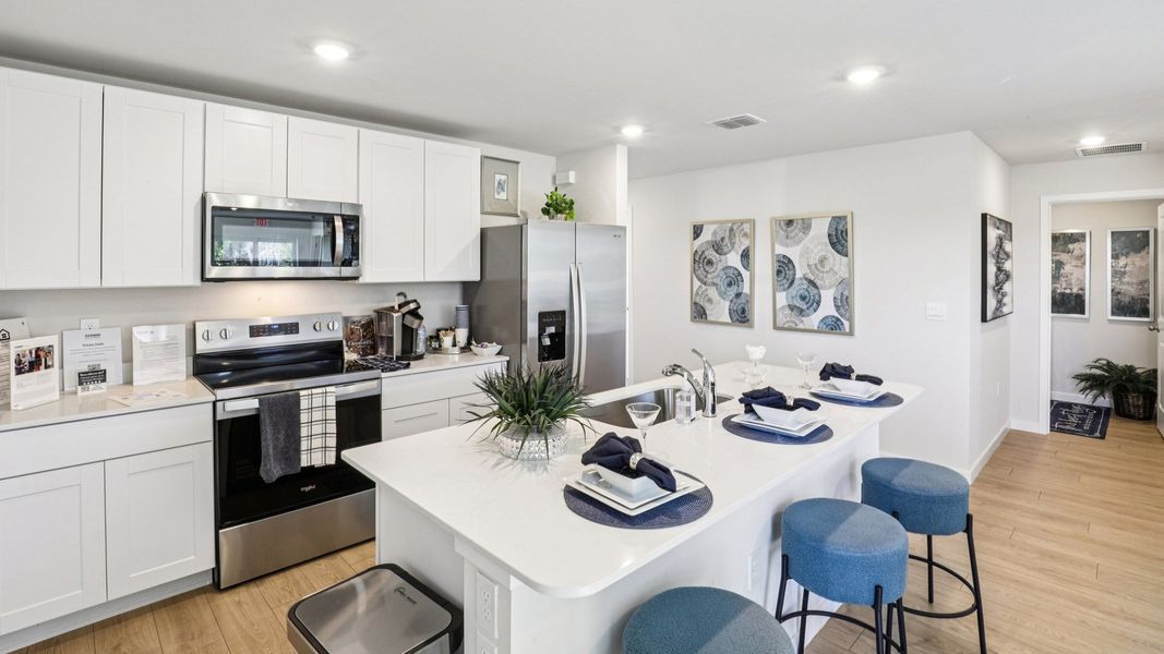 Furnished interior in a model home at Asher Park in Lehigh Acres (Image 25).