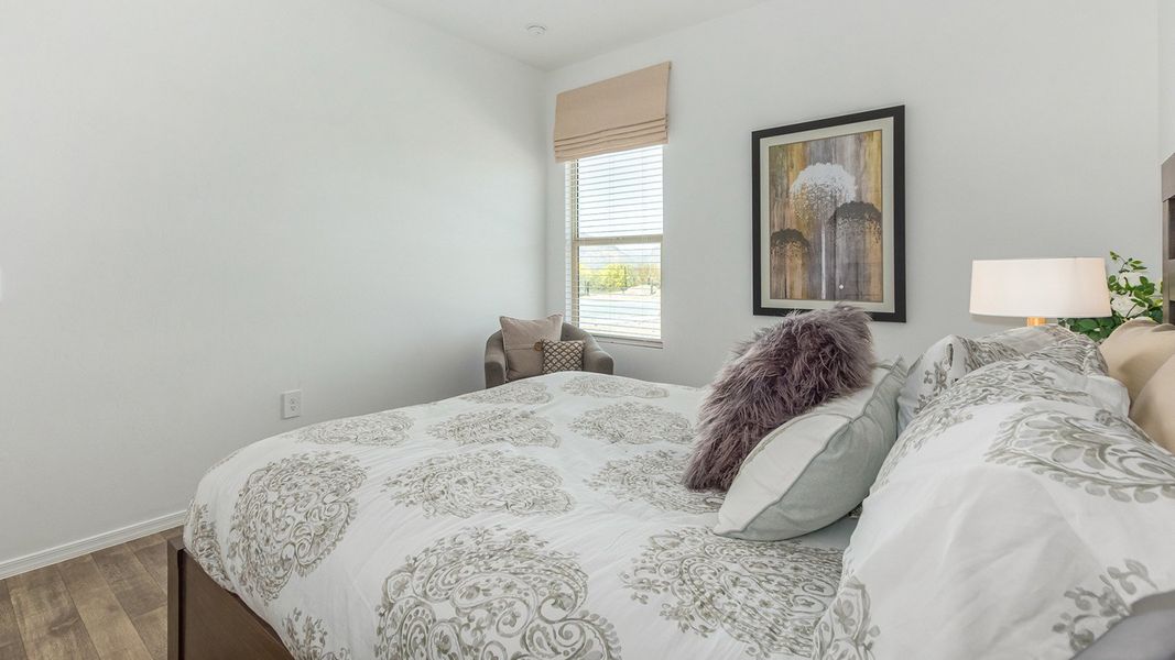 Furnished interior in a model home at Roadrunner Estates in Tucson (Image 29).