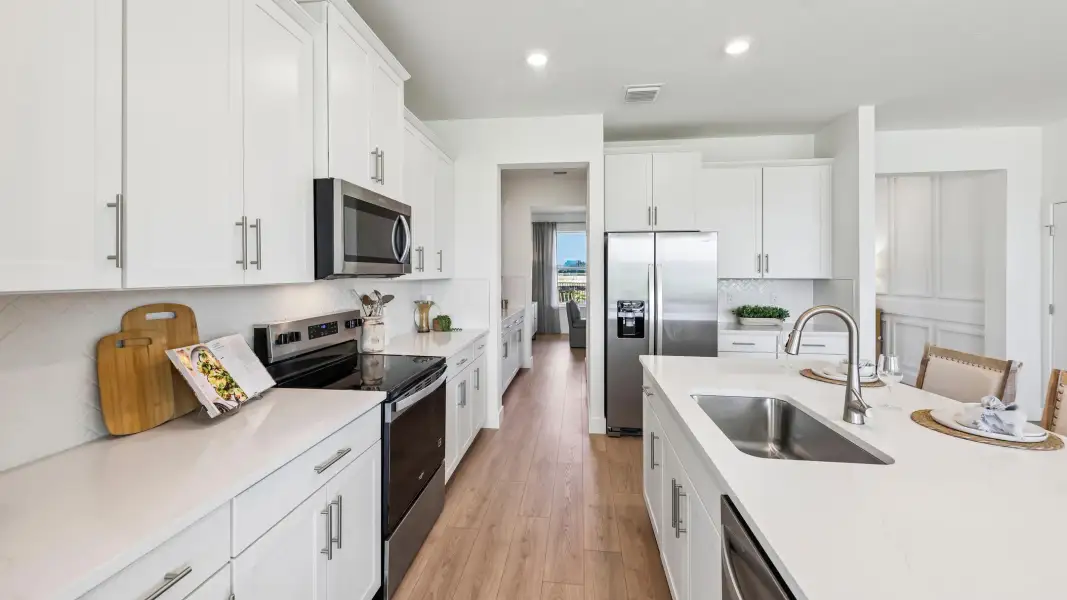Furnished interior in a model home at Sunrise Hills in Brooksville (Image 12).