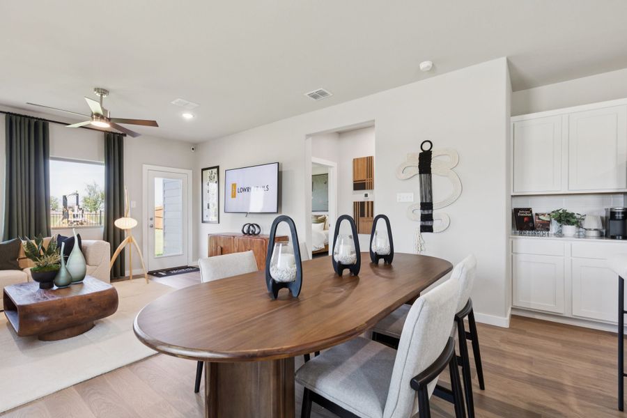 Dining Room in a Lowry Trails New Magnolia Model in Princeton TX by Trophy Signature Homes