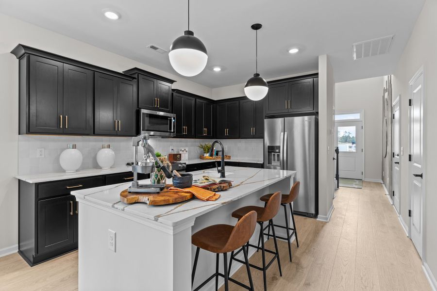 Furnished interior in a model home at Coastal Haven in Leland (Image 9).