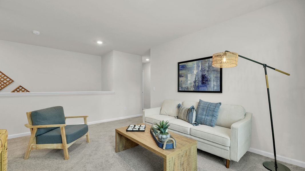 Furnished interior in a model home at The Cove at Mallard Crossing in Summerville (Image 24).