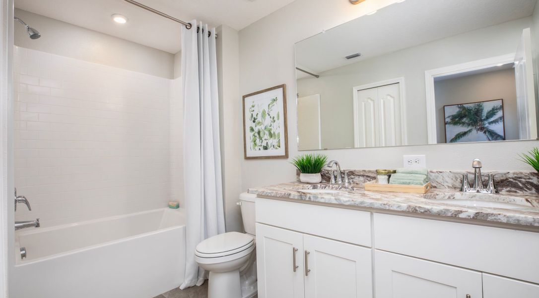 Furnished interior in a model home at Orchid Cove in Bokeelia (Image 8). Furnished interior in a model home at Orchid Cove in Bokeelia (Image 8).