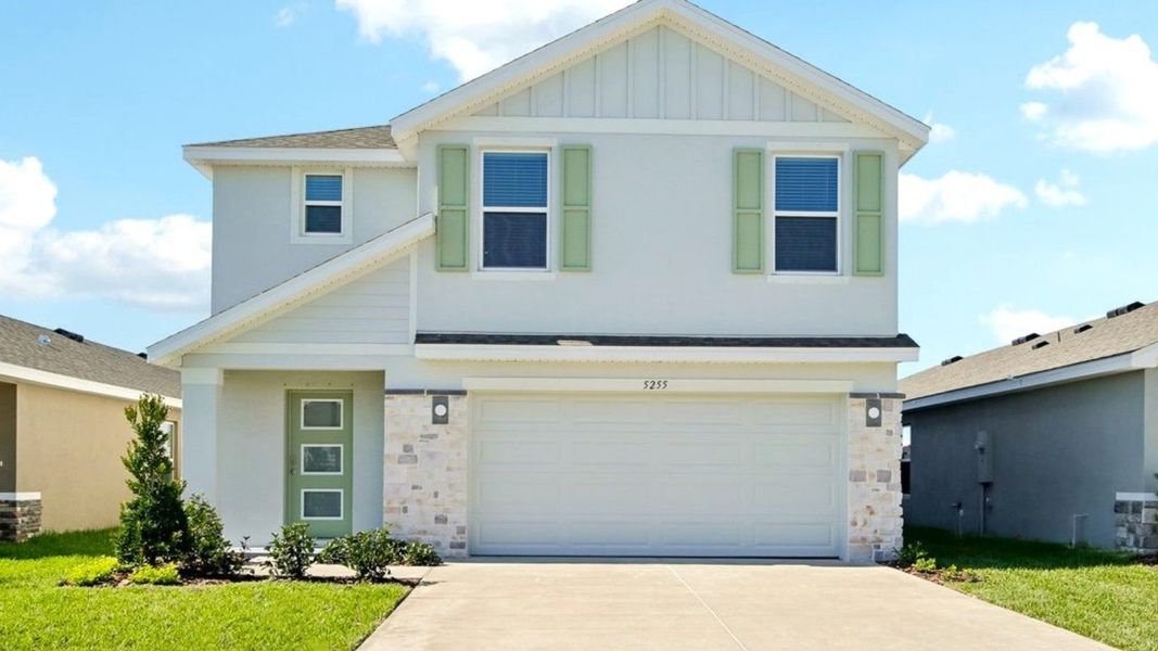 Front exterior of a home in the Berry Bay community, located in Wimauma, FL (Image 3).