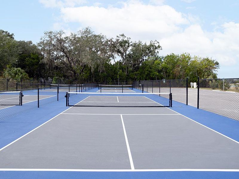 Amenities include private pickleball courts.