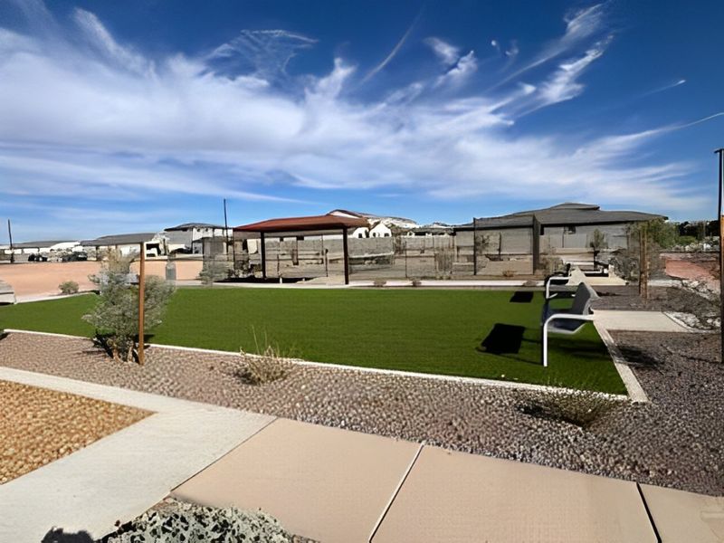 A landscaped park area with seating and pathways in The Ridge Collection at North Copper Canyon by Century Communities (Surprise, AZ).
