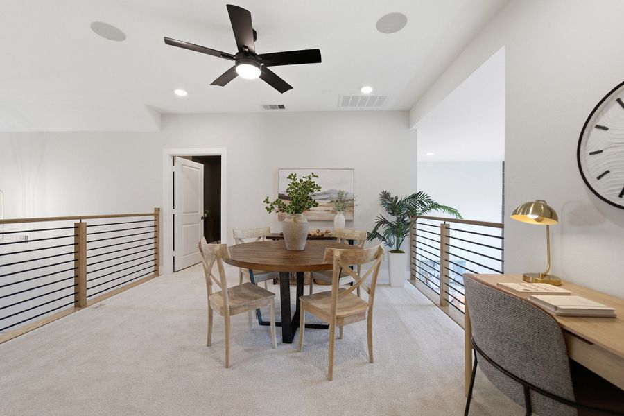 Furnished interior in a model home at Grand Magnolia in Waller (Image 41).