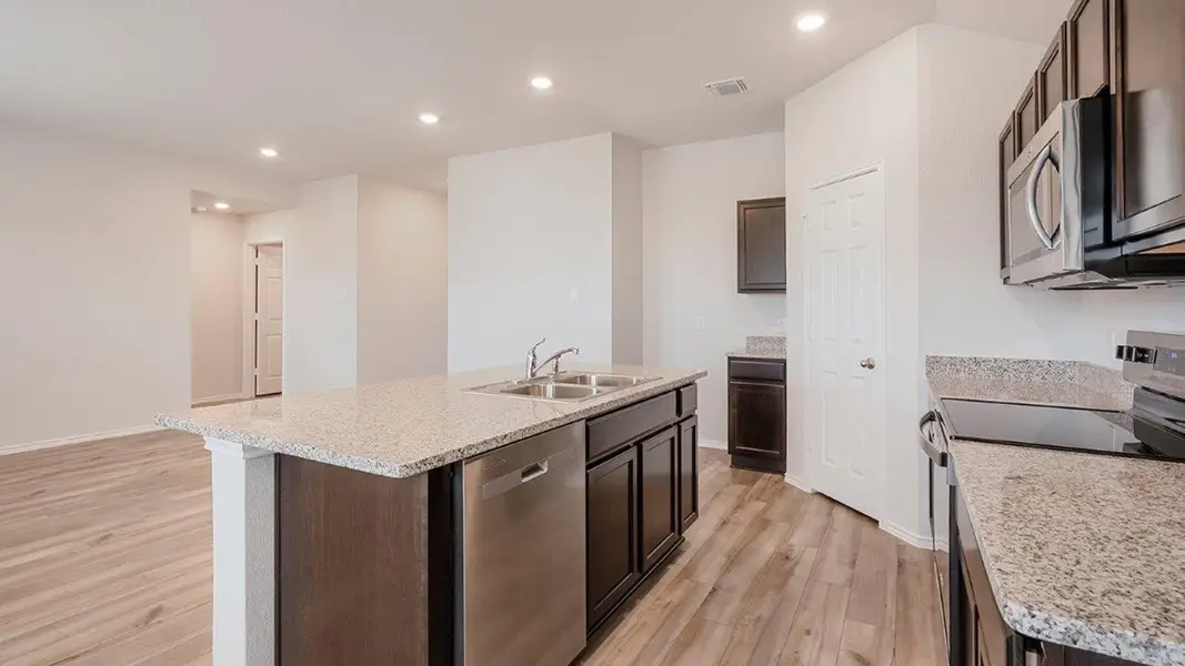 Furnished interior in a model home at The Villages at Schwertner Ranch in Jarrell (Image 6).