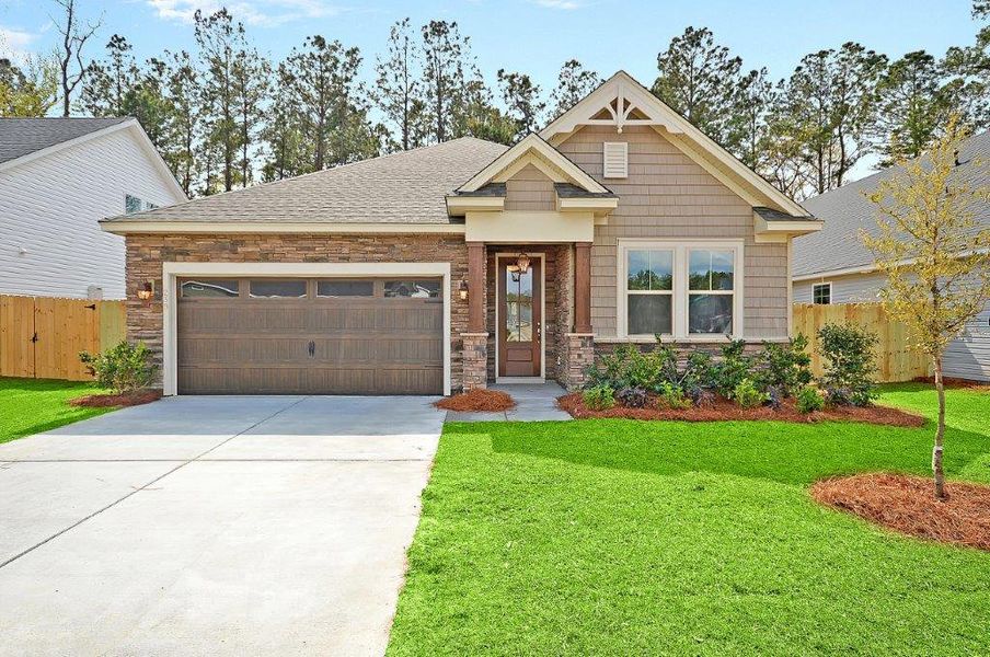 Front exterior of a home in the Huckleberry Estates community, located in Conway, SC (Image 9). Front exterior of a home in the Huckleberry Estates community, located in Conway, SC (Image 9).