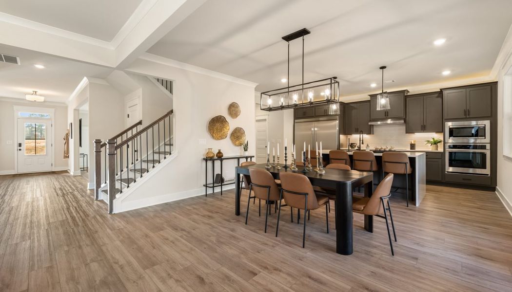 Furnished interior in a model home at Pinecrest Ridge in Dacula (Image 8).