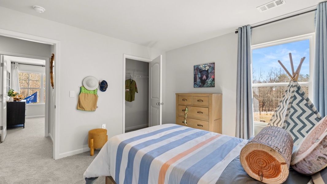 Furnished interior in a model home at Falcon Landing in Gainesville (Image 58).