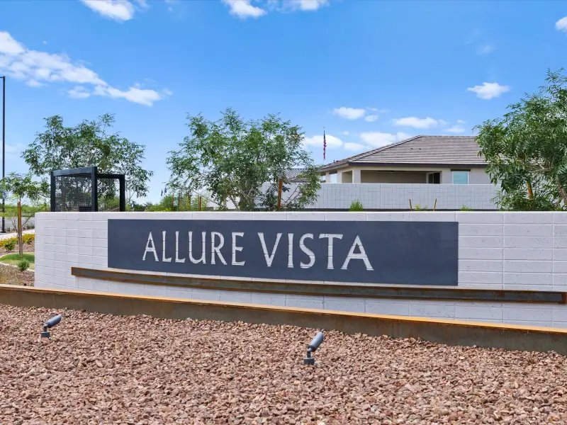 Entrance to the Allure Vista Reserve Series community in Buckeye, AZ, featuring signage and landscaping (Image 12). Entrance to the Allure Vista Reserve Series community in Buckeye, AZ, featuring signage and landscaping (Image 12).