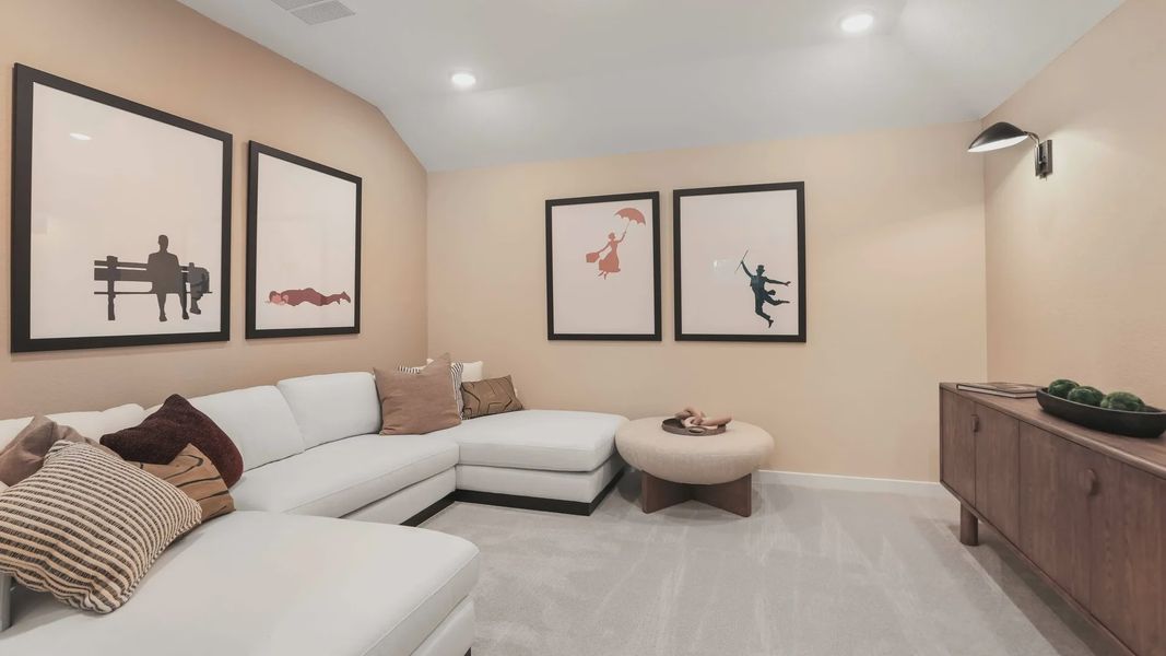 Elegant living space with white sectional and custom art in Mostyn Springs. Elegant living space with white sectional and custom art in Mostyn Springs.