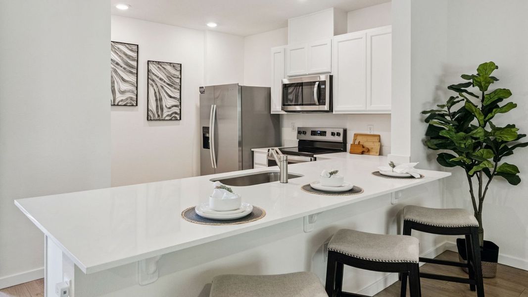 Furnished interior in a model home at Oak Pointe in Apopka (Image 10).