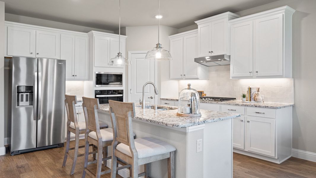 Furnished interior in a model home at Whitewing Trails in Princeton (Image 13).